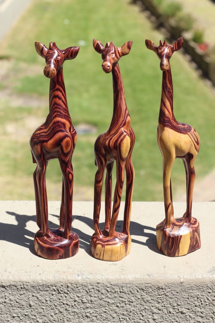 WOODEN ANIMAL SCULPTURES